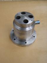 The four nozzle blast cap